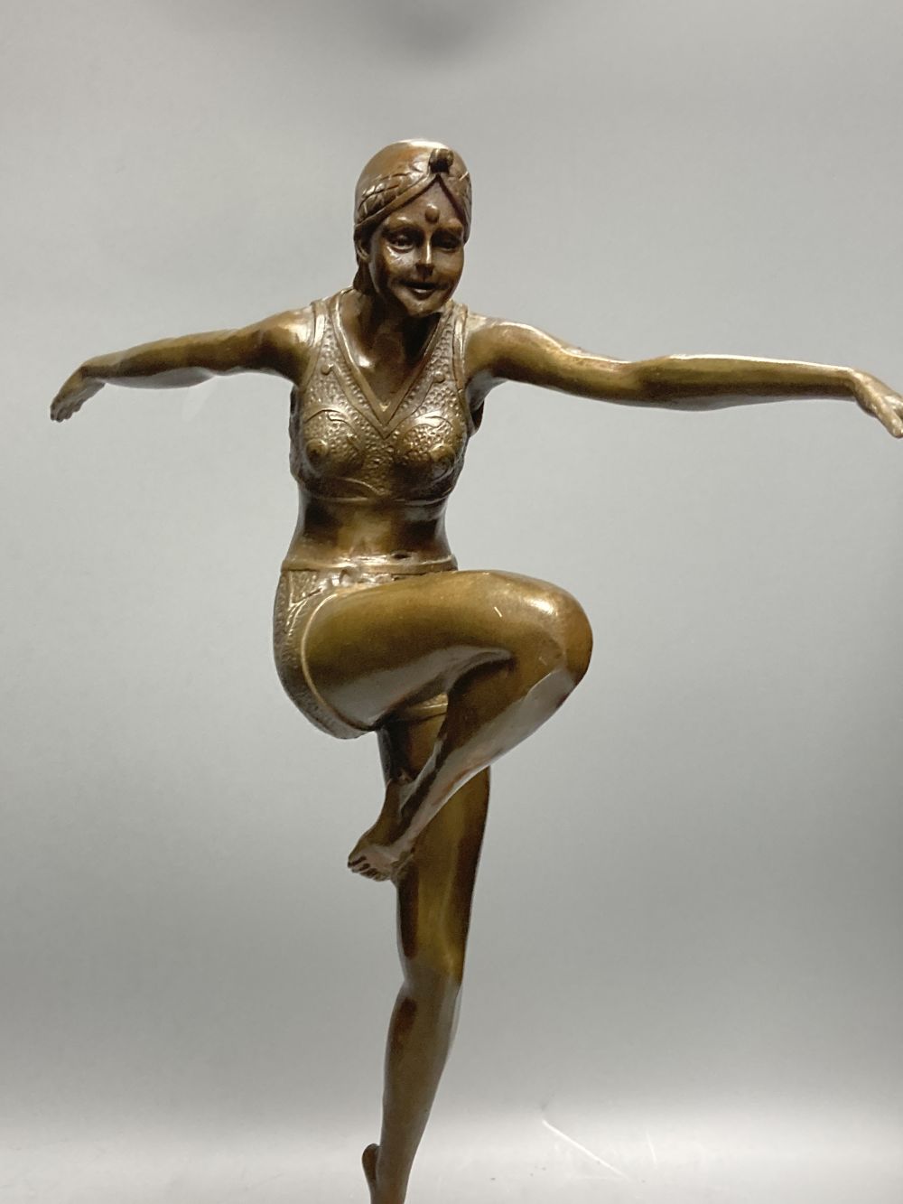 J Philipp. An Art Deco bronze female dancer, cylindrical marble plinth, 57cm